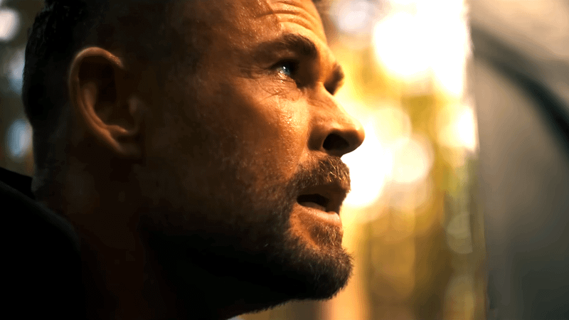 Chris Hemsworth as Thor looking to the sky in Avengers: Doomsday.