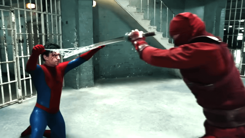 Spider-Man taking on a member of the Hand without his mask.