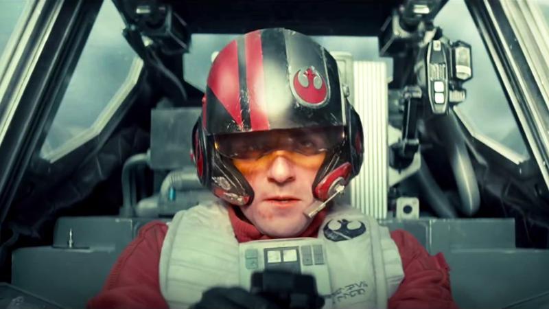 Oscar Isaac as Poe Dameron sitting in an X-Wing in Star Wars: Episode VII