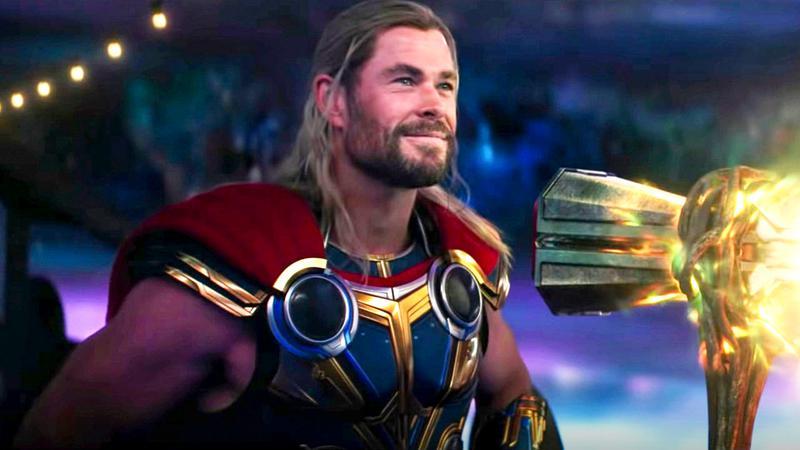 Chris Hemsworth as Thor in a set of blue and gold armor in Thor: Love and Thunder