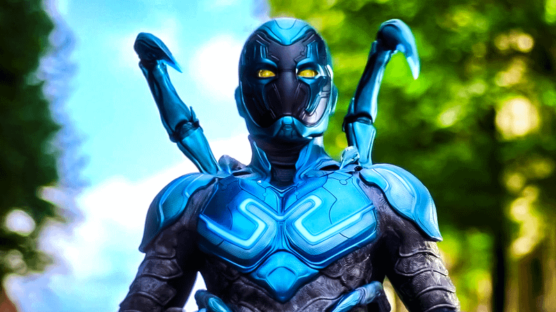 Blue Beetle wearing his suit in the 2023 movie.