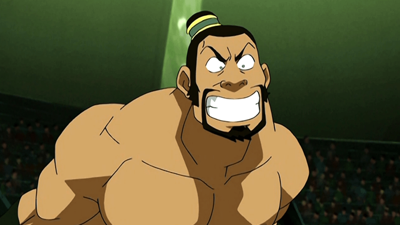 The Boulder smiling with his big teeth showing in a wrestling ring in Avatar: The Last Airbender