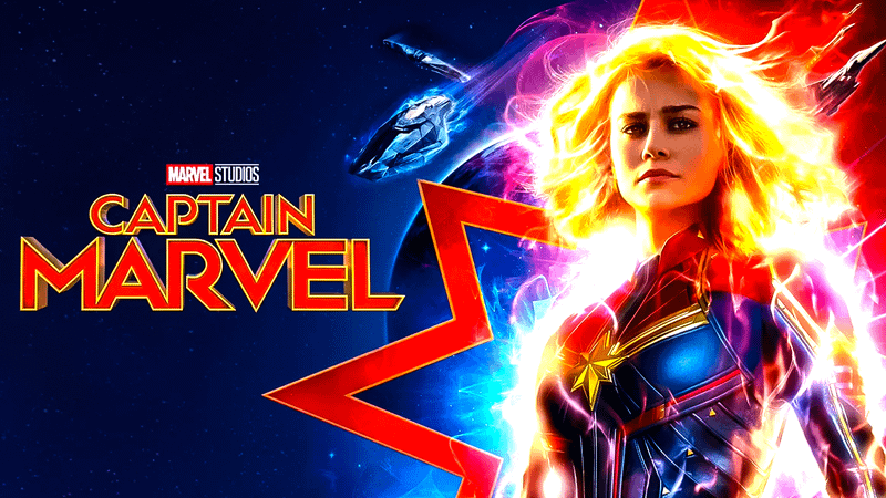 Brie Larson wearing Captain Marvel suit and glowing in Captain Marvel poster