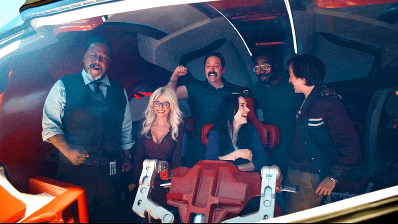 The Daily Planet staff celebrating in Mister Terrific's spaceship in Superman