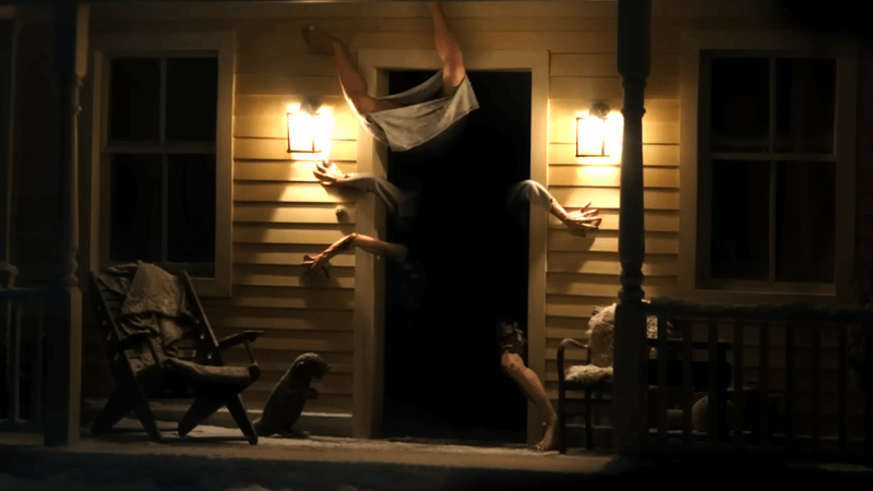 Resident Evil 2026 monster crawling out doorway.