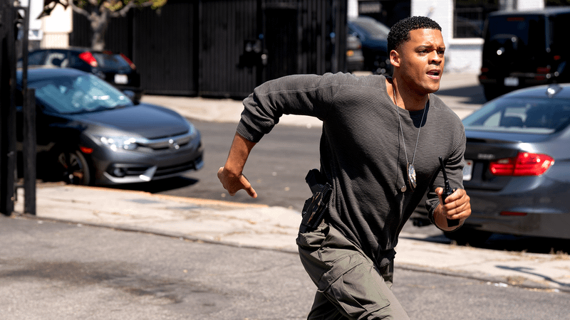 Deric Augustine as Miles Penn in the hospital in The Rookie Season 8, Episode 6.