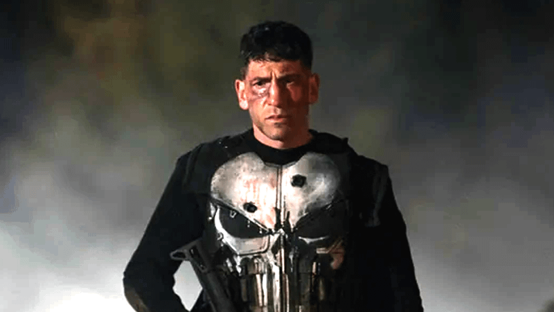 Jon Bernthal as Punisher in his costume and covered in dirt in The Punisher