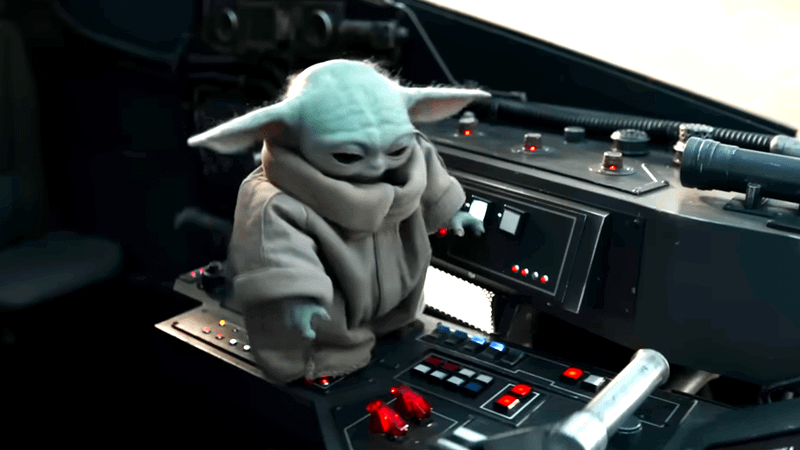 Grogu pushing buttons in The Mandalorian and Grogu.