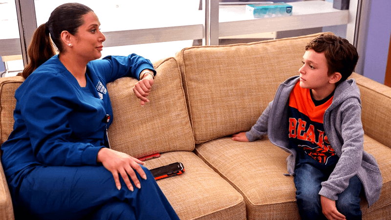 Lorena Diaz as Nurse Doris and Frankie DeMaio as Owen Manning in Chicago Med Season 11, Episode 2.