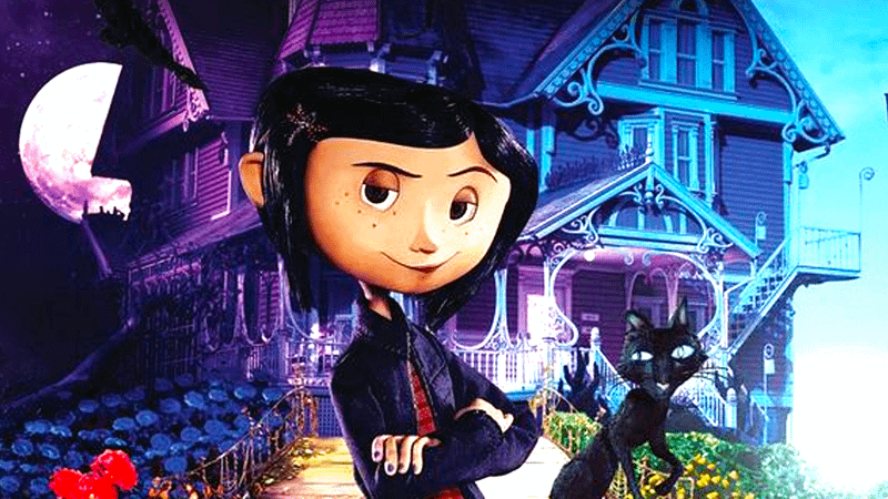 Coraline with her arms crossed in front of an old house