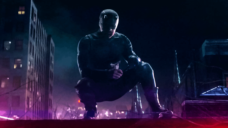 Charlie Cox Daredevil in Black suit on rooftop in Born Again Season 2.