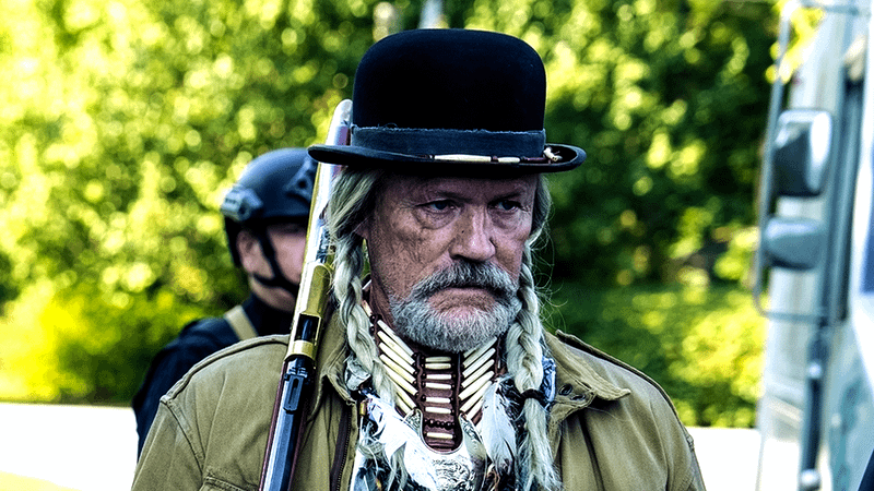 Michael Rooker as Red St. Wild in Peacemaker Season 2.