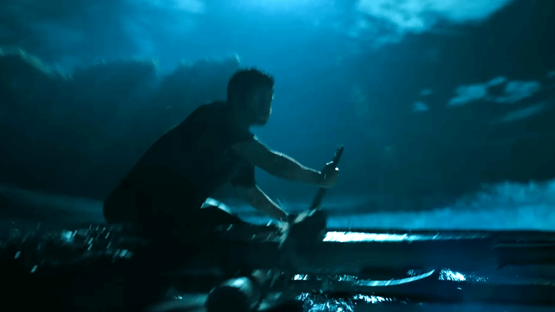 Dylan O'Brien as Bradley on a raft in Send Help