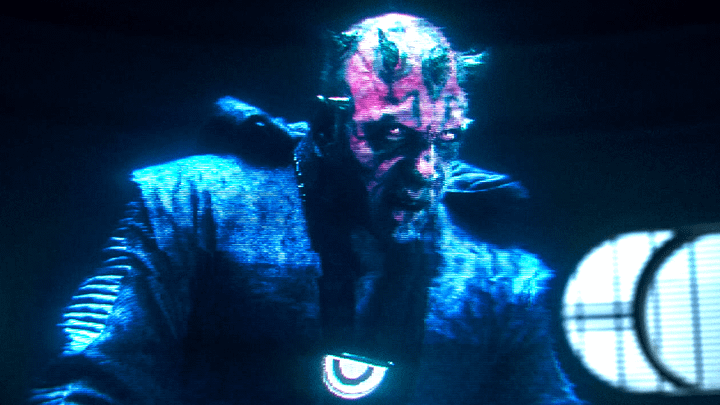 A hologram of Maul sitting down in Solo: A Star Wars Story.