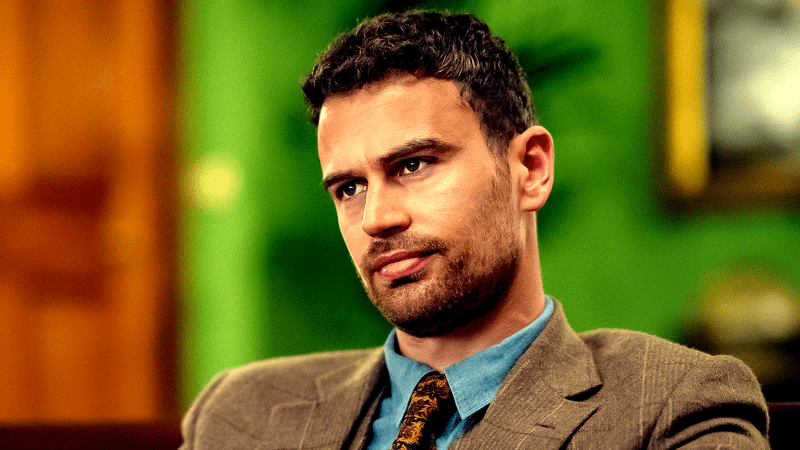 Theo James as Eddie Horniman wearing a suit in The Gentlemen