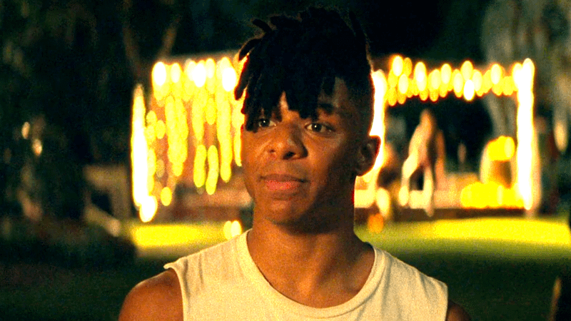 Zendé Murdock as Bez Willis standing in the dark in The Runarounds