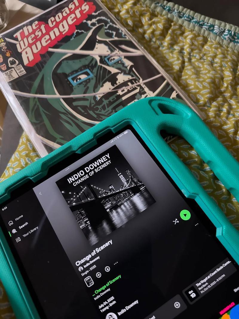 The West Coast Avengers comic over an iPad with Indio Downey's Change of Scenery playing
