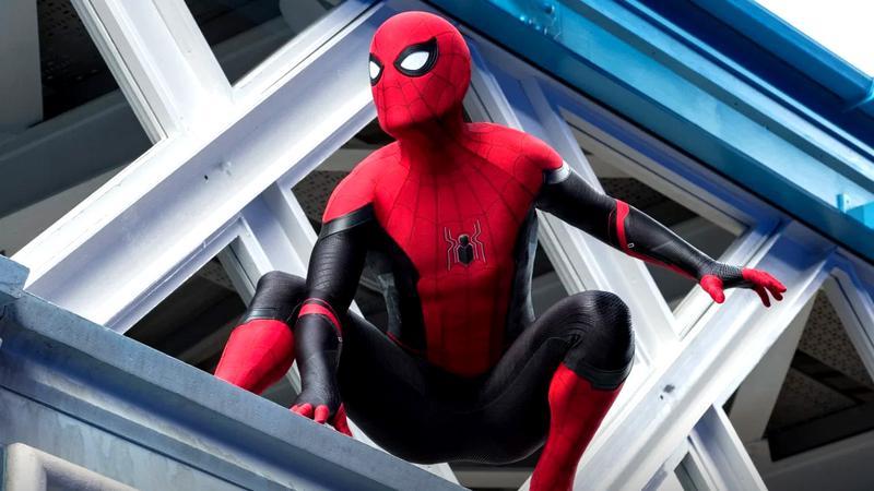 Spider-Man perched on a building in the Upgraded Suit in Spider-Man: Far From Home