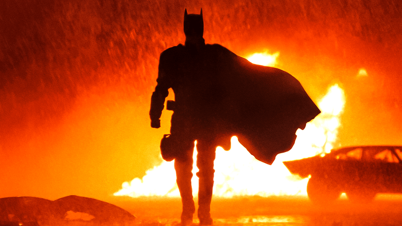 The Batman walking away from car silhouette scene.