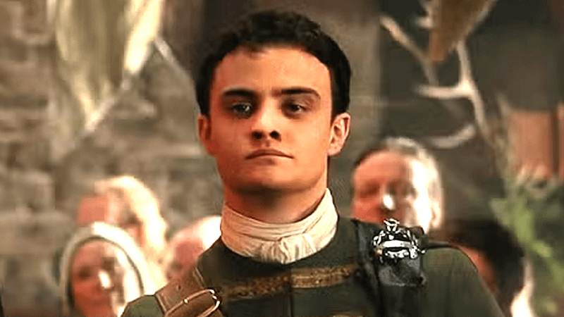 Séamus McLean Ross as Colum MacKenzie standing boldly in Outlander: Blood of my Blood