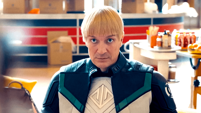 Nathan Fillion as Guy Gardner with shock on his face in Superman