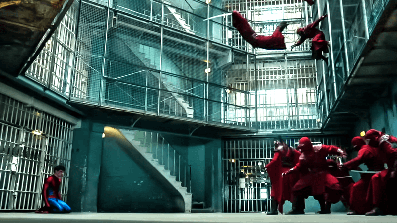 The Hand ready to attack a maskless Spider-Man.