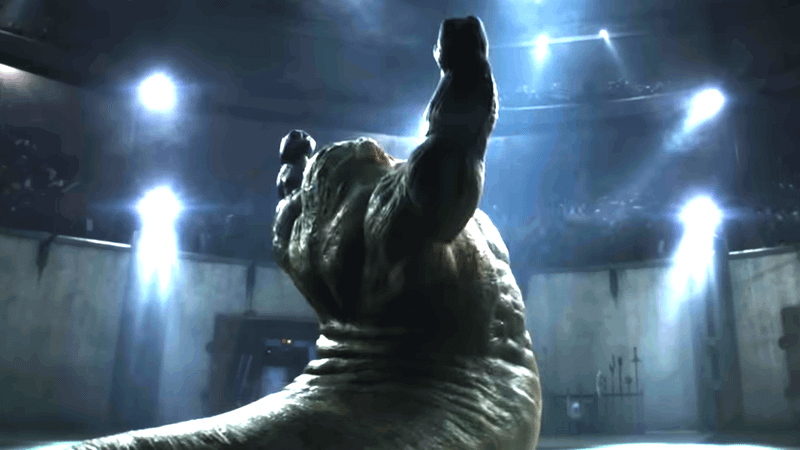 Rotta the Hutt raising his arms in front of an audience in The Mandalorian & Grogu