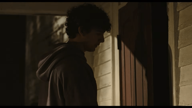 Evan entering the haunted house in Widow's Bay Episode 5.
