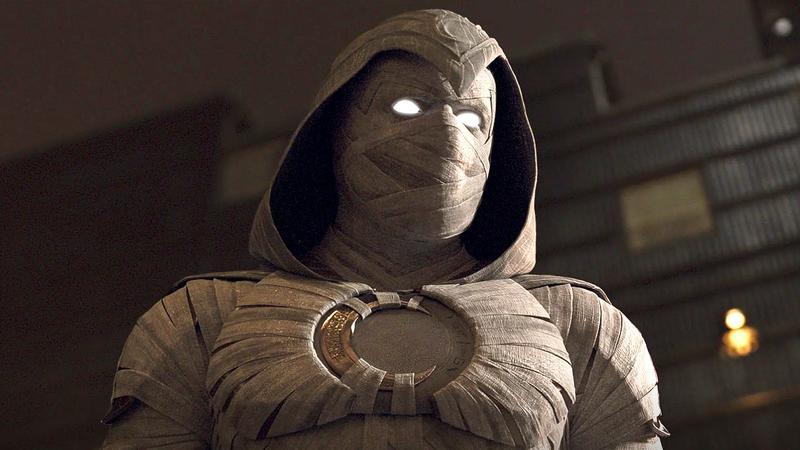 Oscar Isaac as Moon Knight standing in his hood in Moon Knight