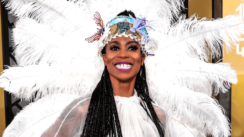 Hannah Beachler in a white dress with white feathers at the premiere for 'Black Panther: Wakanda Forever.'