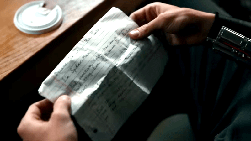 Peter Parker holding the letter he wrote for MJ.