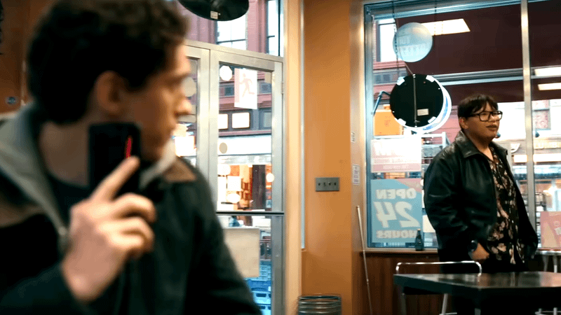 Peter Parker seeing Ned in a shop.