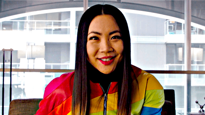 Jona Xiao wearing multicolored jacket