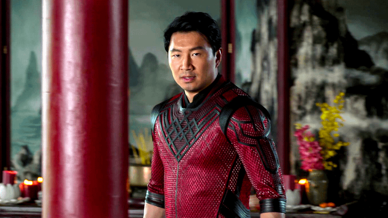 Shang-Chi wears his red dragon-scale armor as he confronts his father Wenwu in Shang-Chi and the Legend of the Ten Rings.
