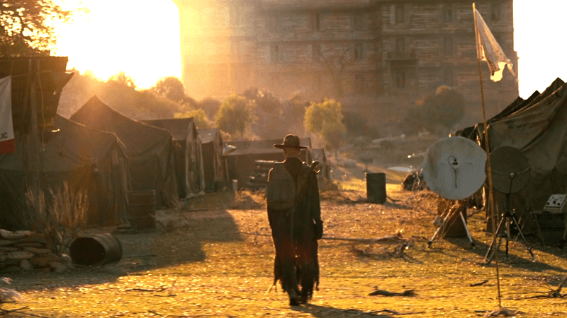 Walton Goggins as Ghoul walking down a dusty street in Fallout Season 2