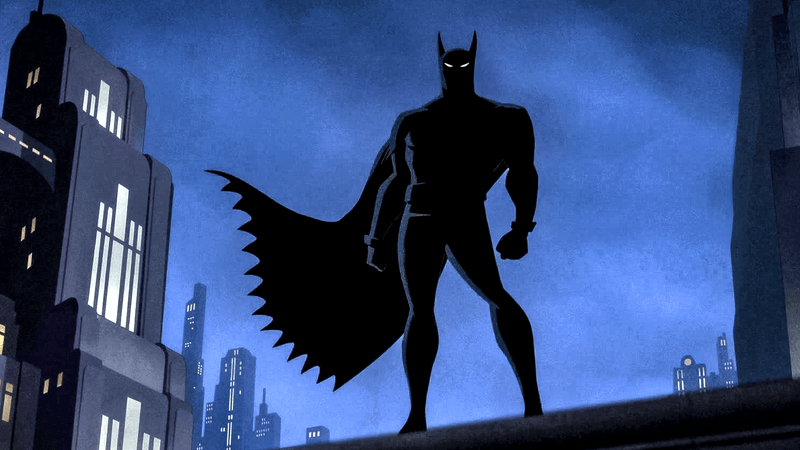 Batman silhouette on roof in Caped Crusader.