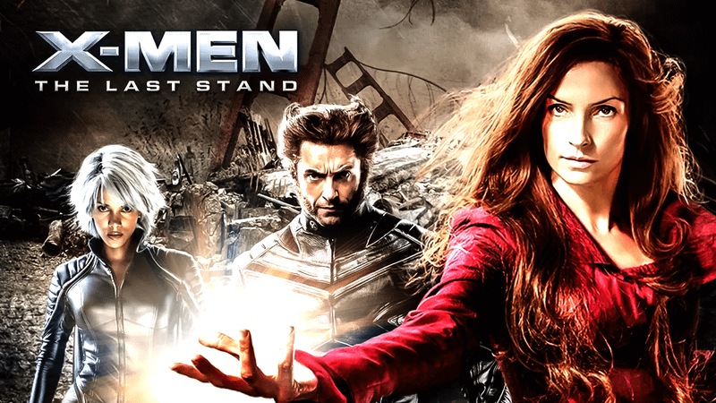 Halle Berry as Storm, Hugh Jackman as Wolverine, and Famke Janssen as Jean Gray standing in front of the twisted remains of the Golden Gate Bridge in X-Men: The Last Stand
