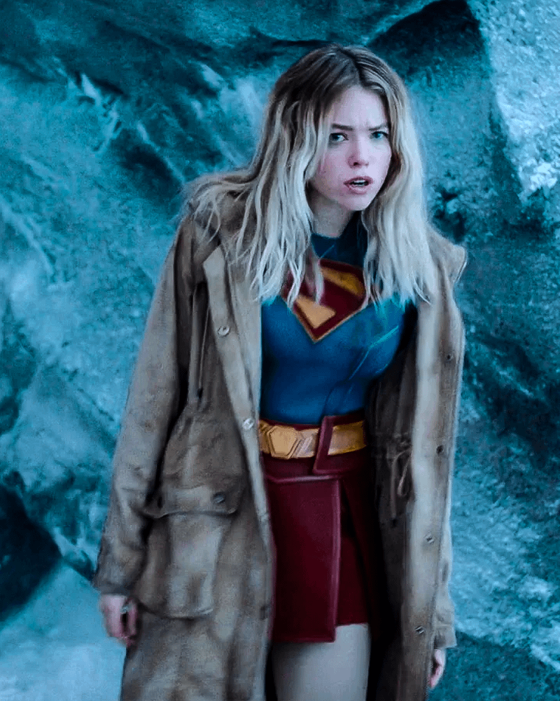 Milly Alcock as Supergirl with a trench coat in in Superman