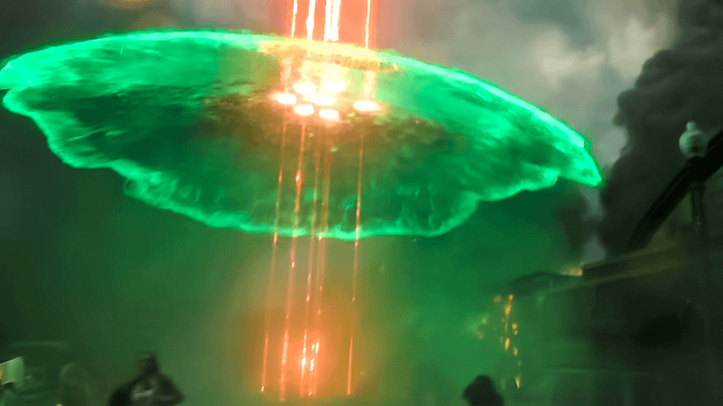 Hal Jordan blocks lasers with a force field.