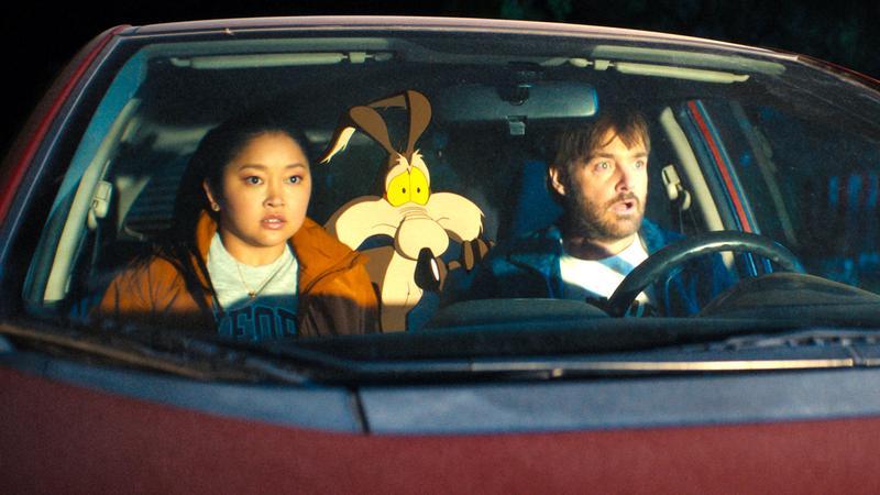 Lana Condor, Wile E. Coyote, and Will Forte looking at Bugs Bunny.