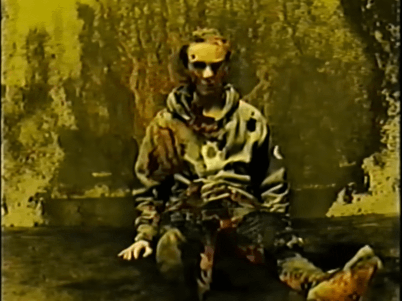 Image from Backrooms - Missing Persons video showing decaying body.