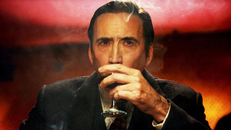 Nicolas Cage as Ben Reilly drinking in Spider-Noir.