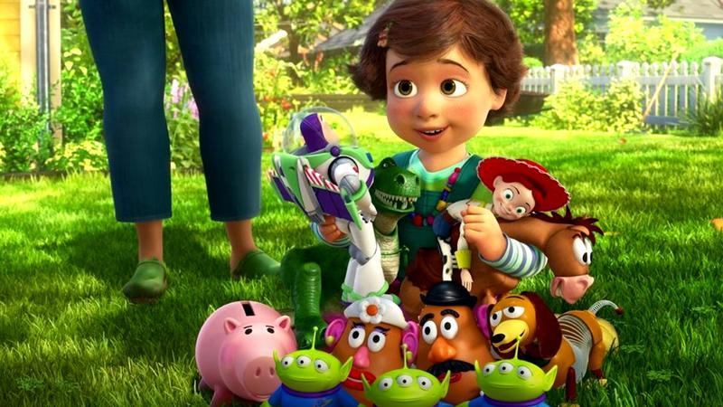 Bonnie sitting in the grass with her toys in Toy Story 3