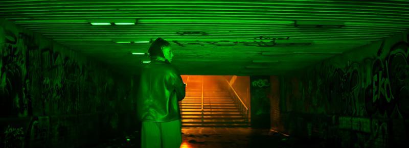Clayface trailer, Dr Caitlin Corr walking through underpass.