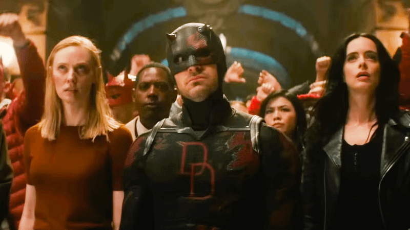 Charlie Cox as Daredevil alongside Karen Page and Jessica Jones.