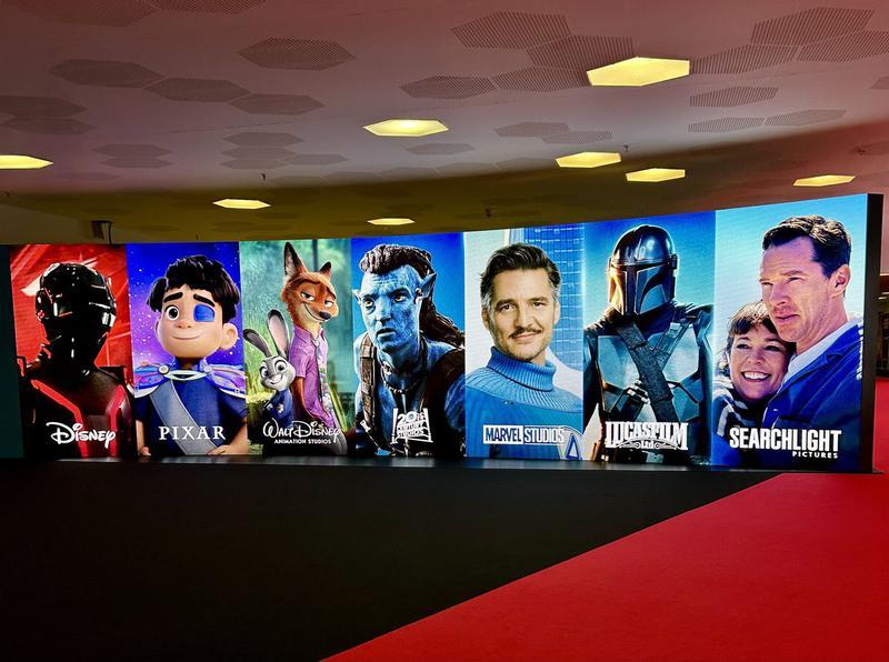 Disney ad with Tron, Elio, Judy Hopps, Nick Wilde, Jake Sully, Mr. Fantastic, Mandalorian, Olivia Colman, and Benedict Cumberbatch