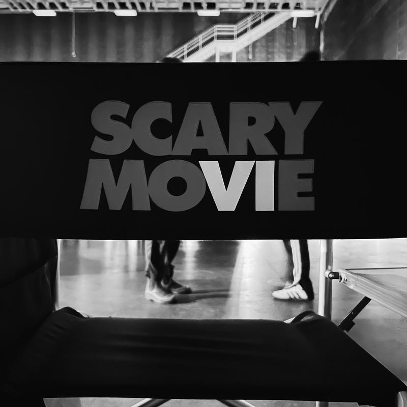 Scary Movie 6 logo on the back of a chair