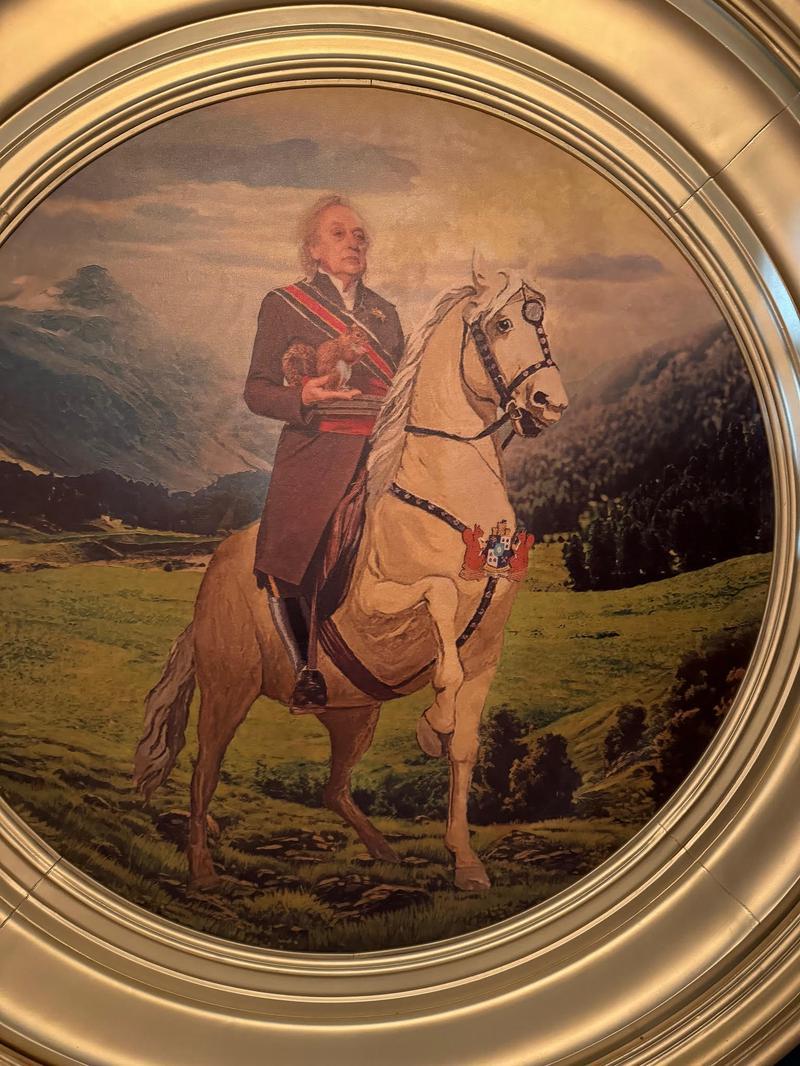 A painting of Vasil Ghurkos on a horse with a squirrel in his hand in Superman