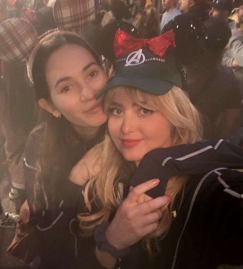 Kathryn Newton wearing an Avengers: Doomsday cap