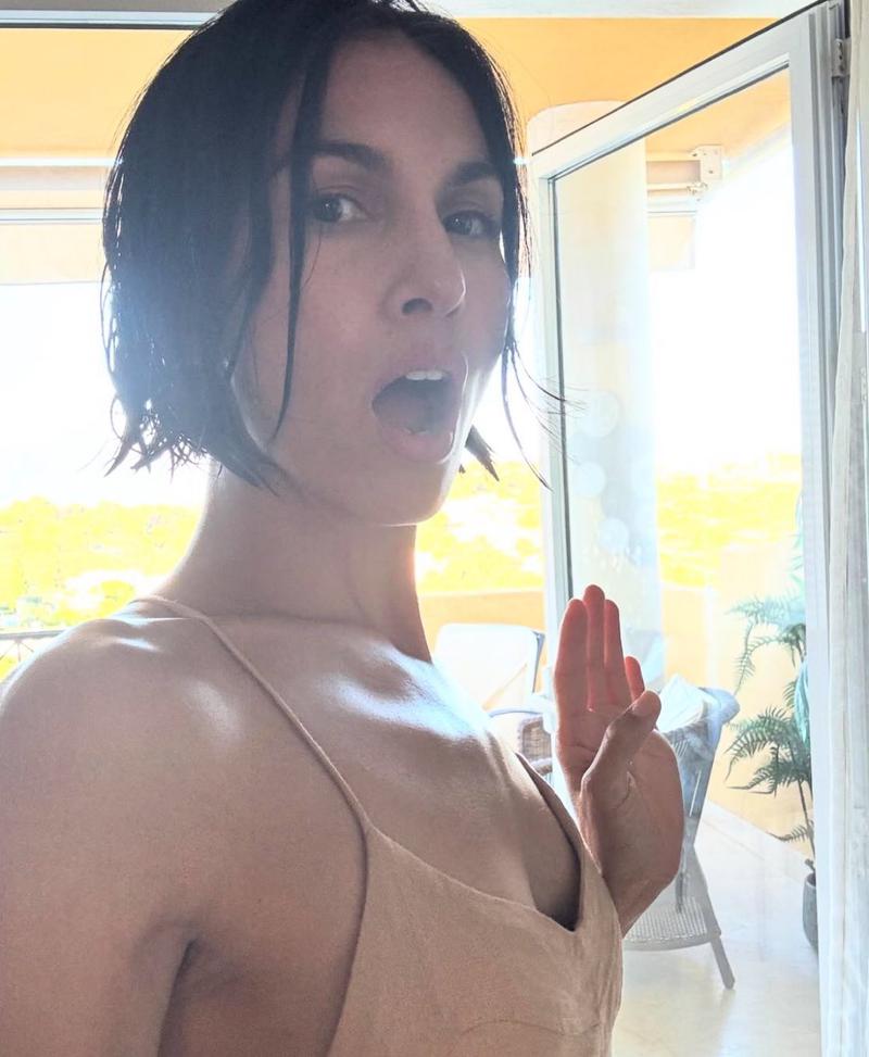 Elodie Yung standing with her mouth agape in a selfie on Instagram